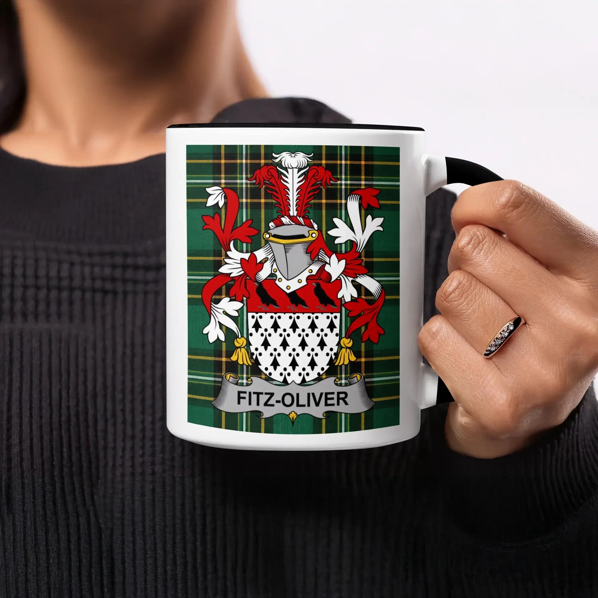 Mug with Fitz-Oliver family crest on green tartan background.