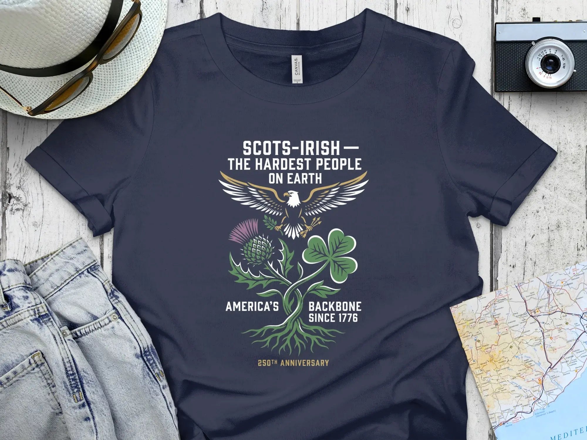 Dark blue t-shirt with "Scots-Irish: The Hardest People On Earth" text and symbols.