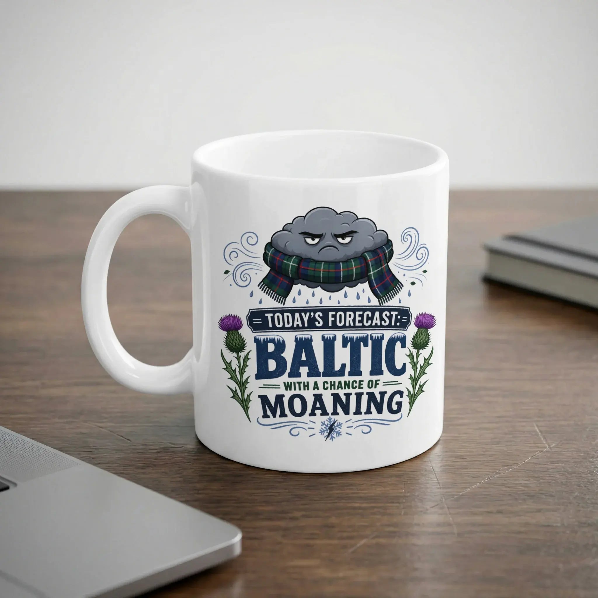 White mug with "BALTIC WITH A CHANCE OF MOANING" text and a stormy cloud graphic.