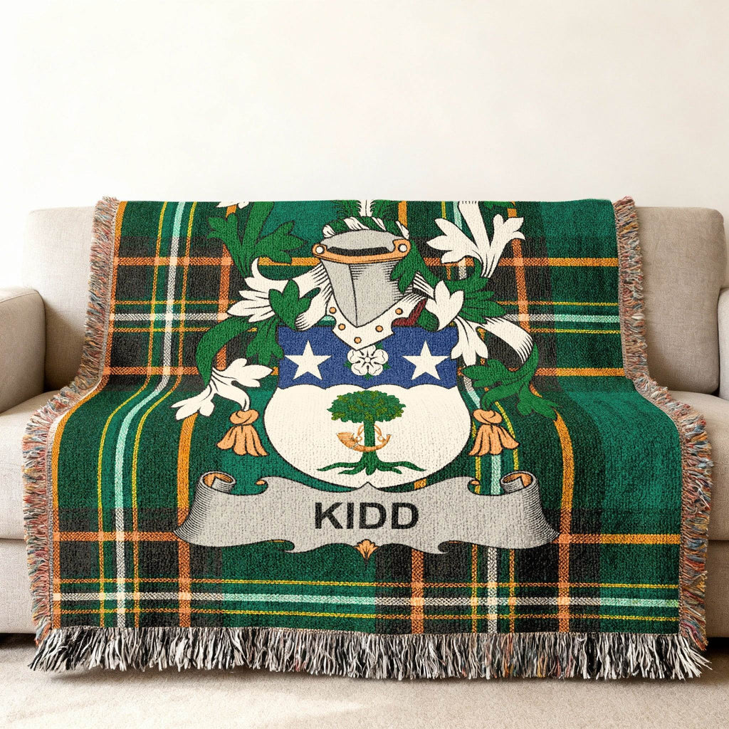 Green tartan throw blanket featuring the Kidd family crest.