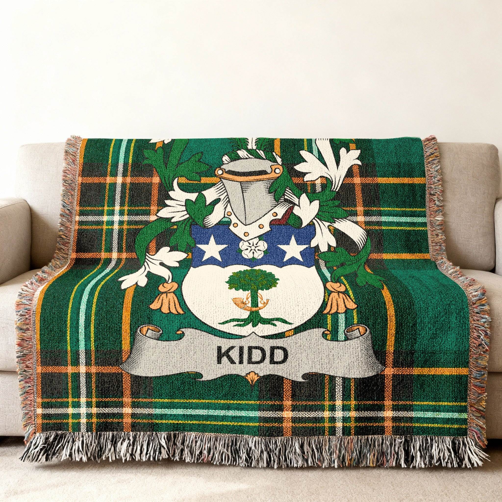Green tartan throw blanket featuring the Kidd family crest.