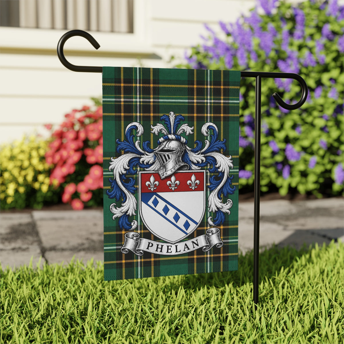 Phelan Irish family crest garden flag on Irish National Tartan, garden view