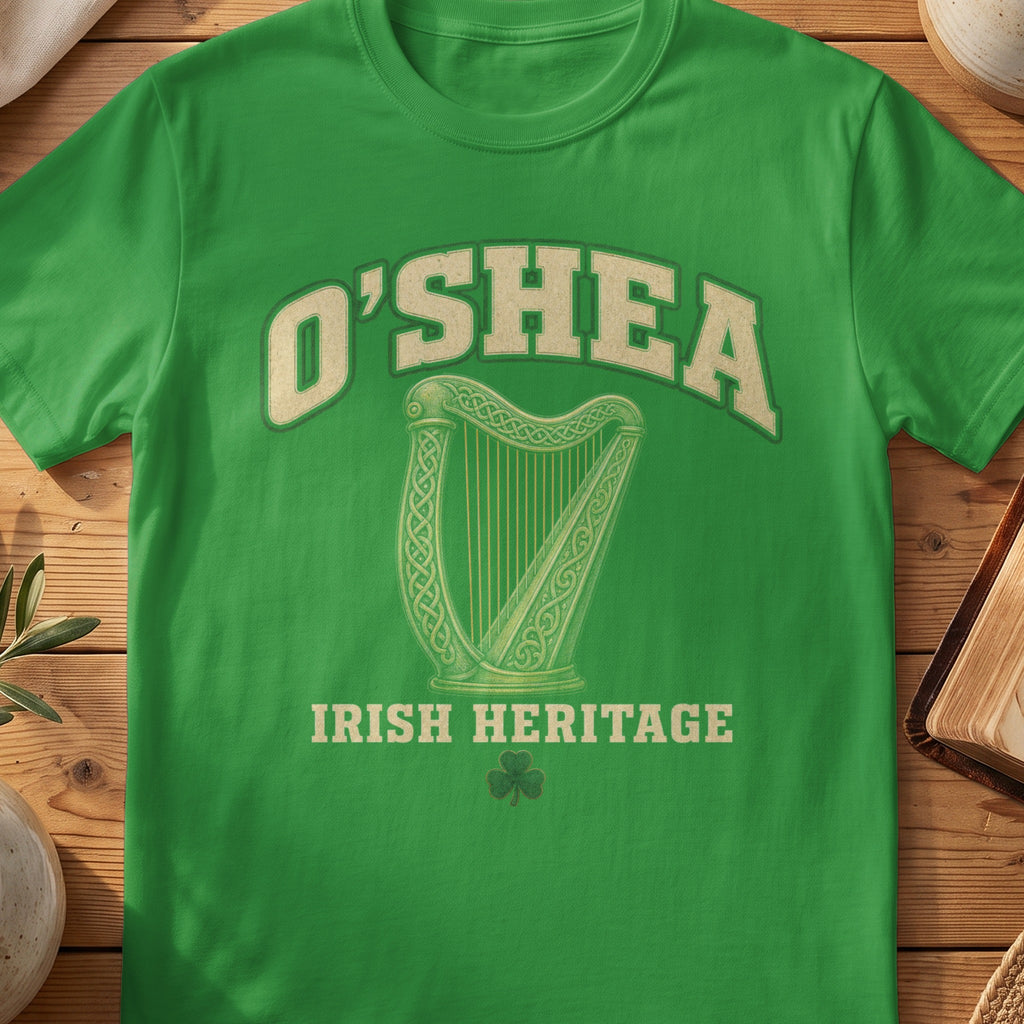 O'Shea Irish harp T-shirt in Irish Green, with cream surname lettering, a gold-toned harp, green shamrock and “Irish Heritage” text.