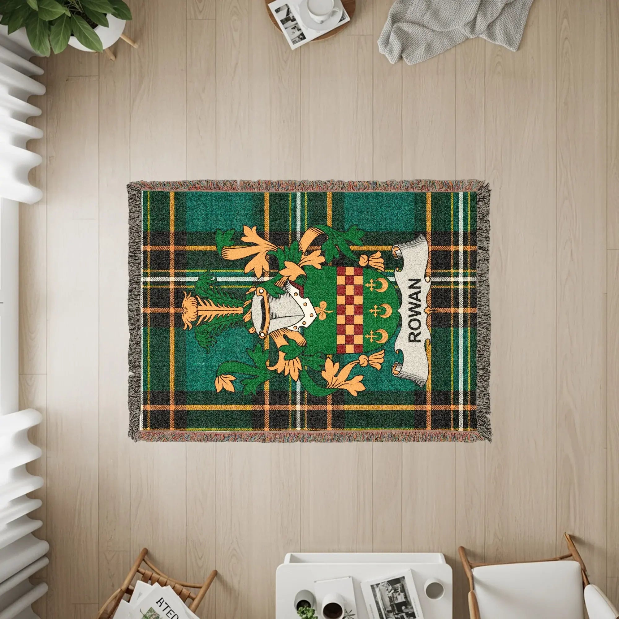 Green tartan blanket with Rowan crest and text.