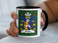 Mug featuring the Youngs family crest on a tartan background.