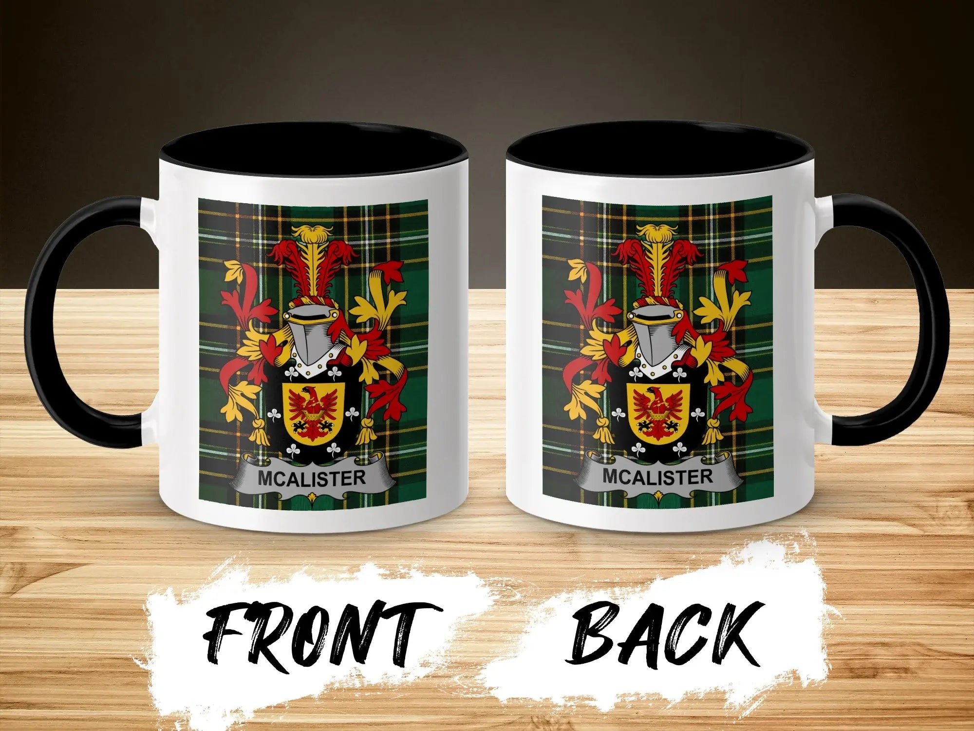 Two mugs with the McAlister family crest on a wood-grain background.