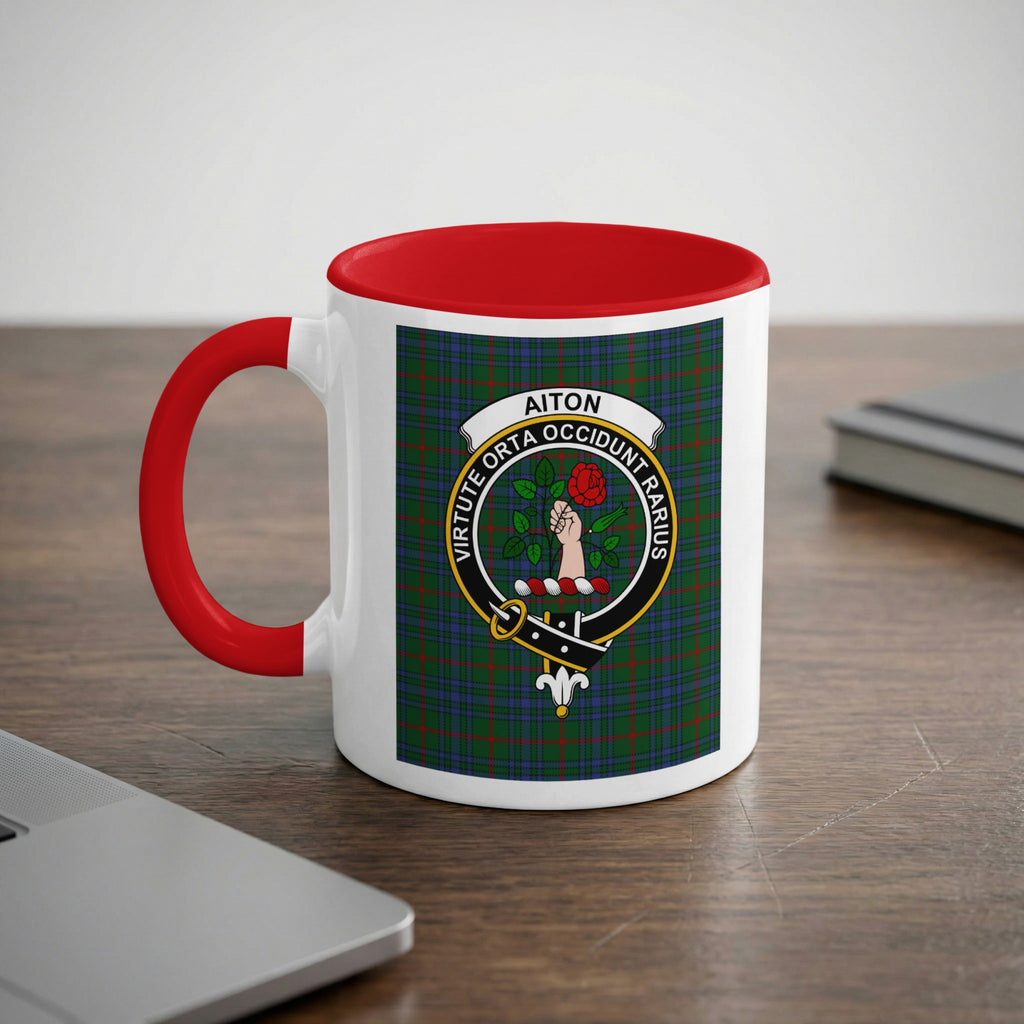 Aiton Scottish family crest artwork on an 11 oz red accent mug with a tartan background