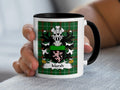 Mug with the Marsh family crest on a green plaid background.