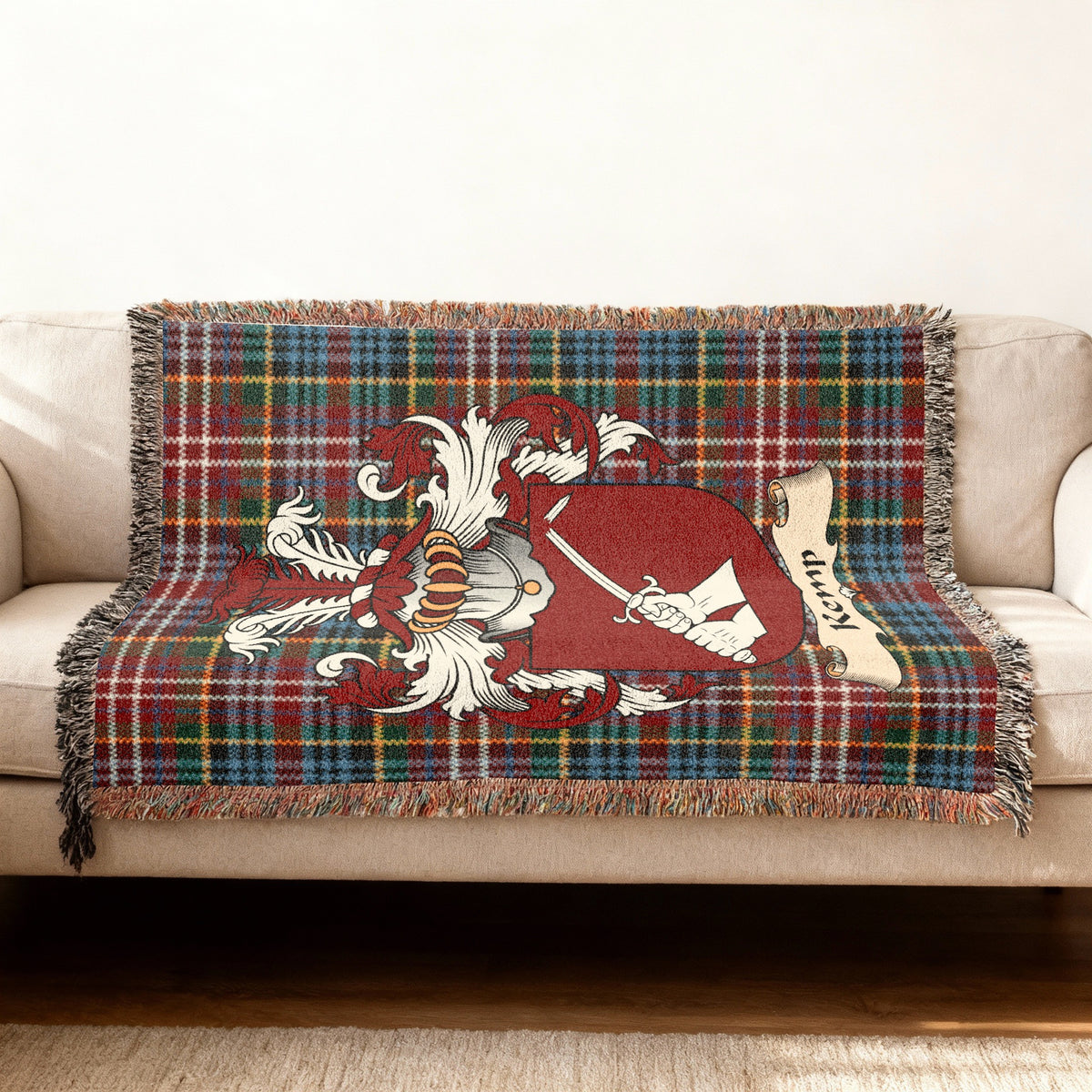 Kemp Scottish woven blanket with family shield and Caledonia tartan background