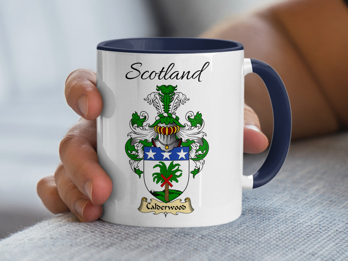 White Calderwood heritage mug with navy handle and interior, displaying “Scotland” and the colourful family emblem.