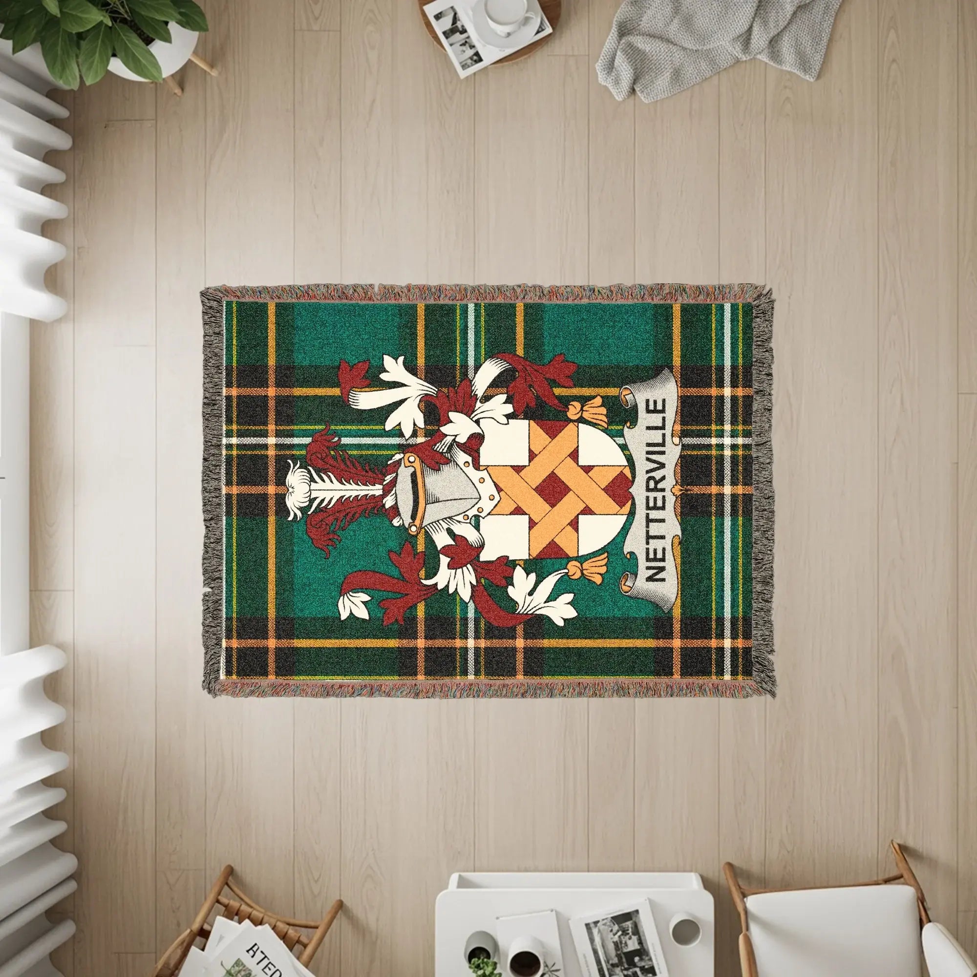 Woven throw rug with Netterville family crest on green plaid background.