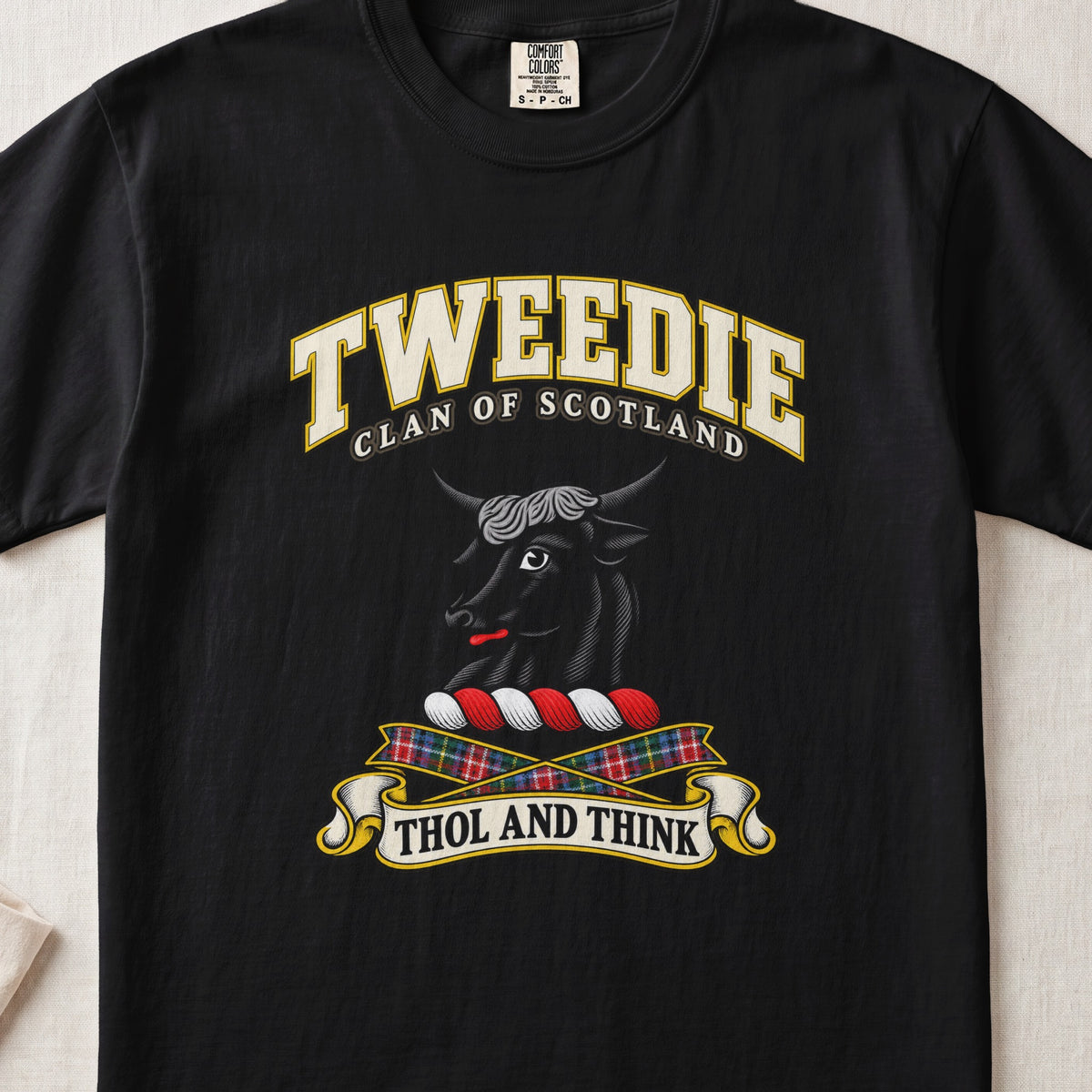 Tweedie Scottish clan T-shirt in Black, front view with a black bull head and motto design.