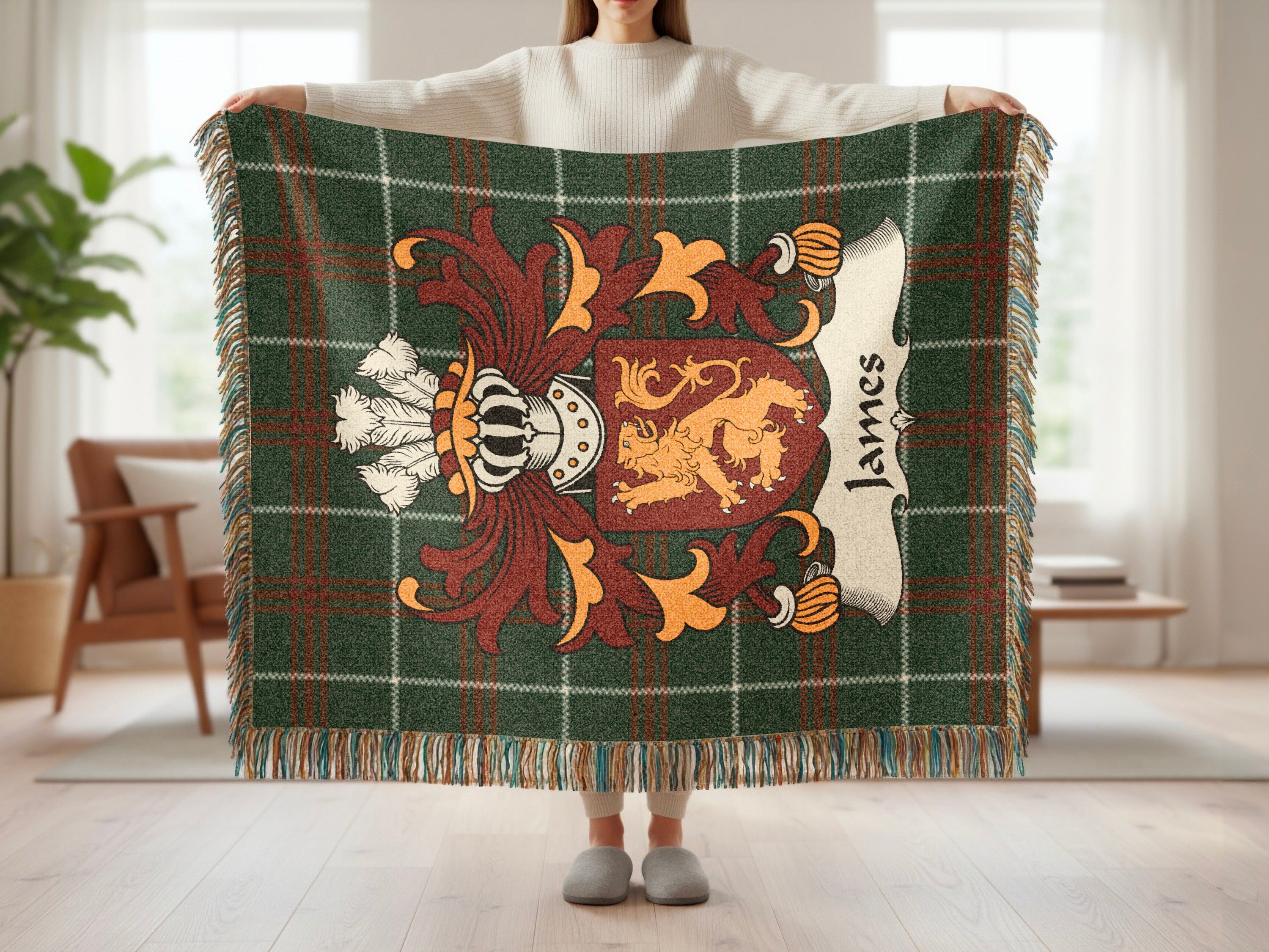 Tartan blanket with James family crest featuring a lion.