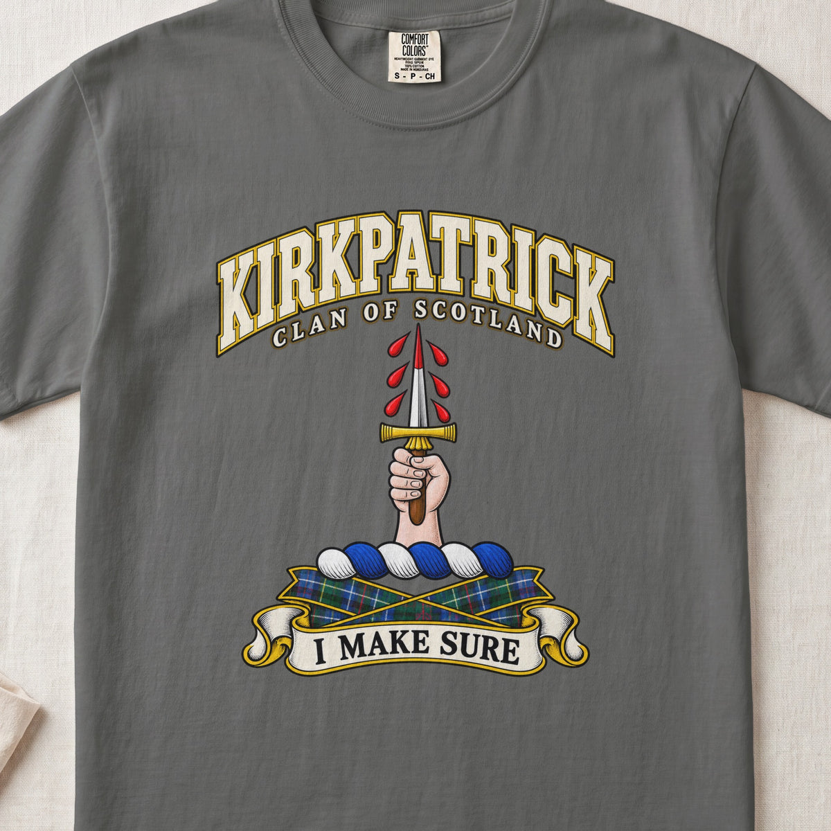 Kirkpatrick Scottish clan T-shirt in Pepper, front view with a hand holding an upright dagger with red droplets and motto design.