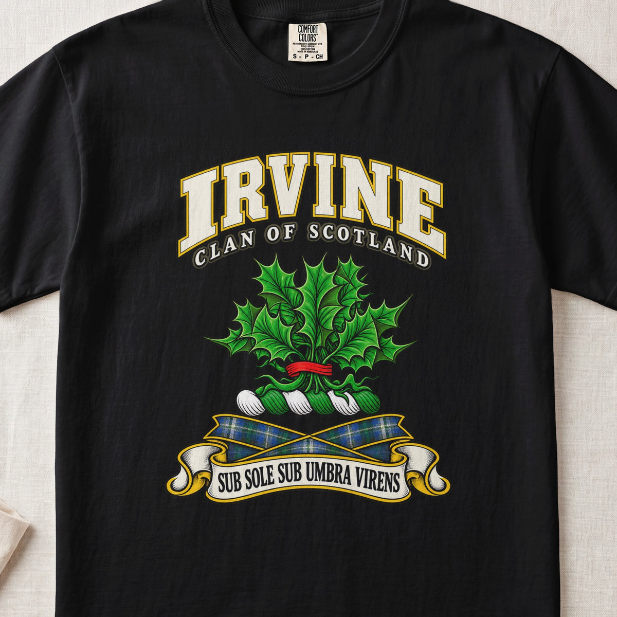 Irvine Scottish clan T-shirt in Black, front view with green holly leaves with red berries and motto banner.