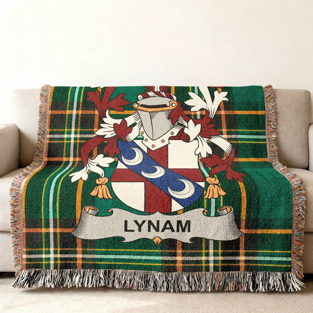 Green plaid blanket with Lynam family crest and name.