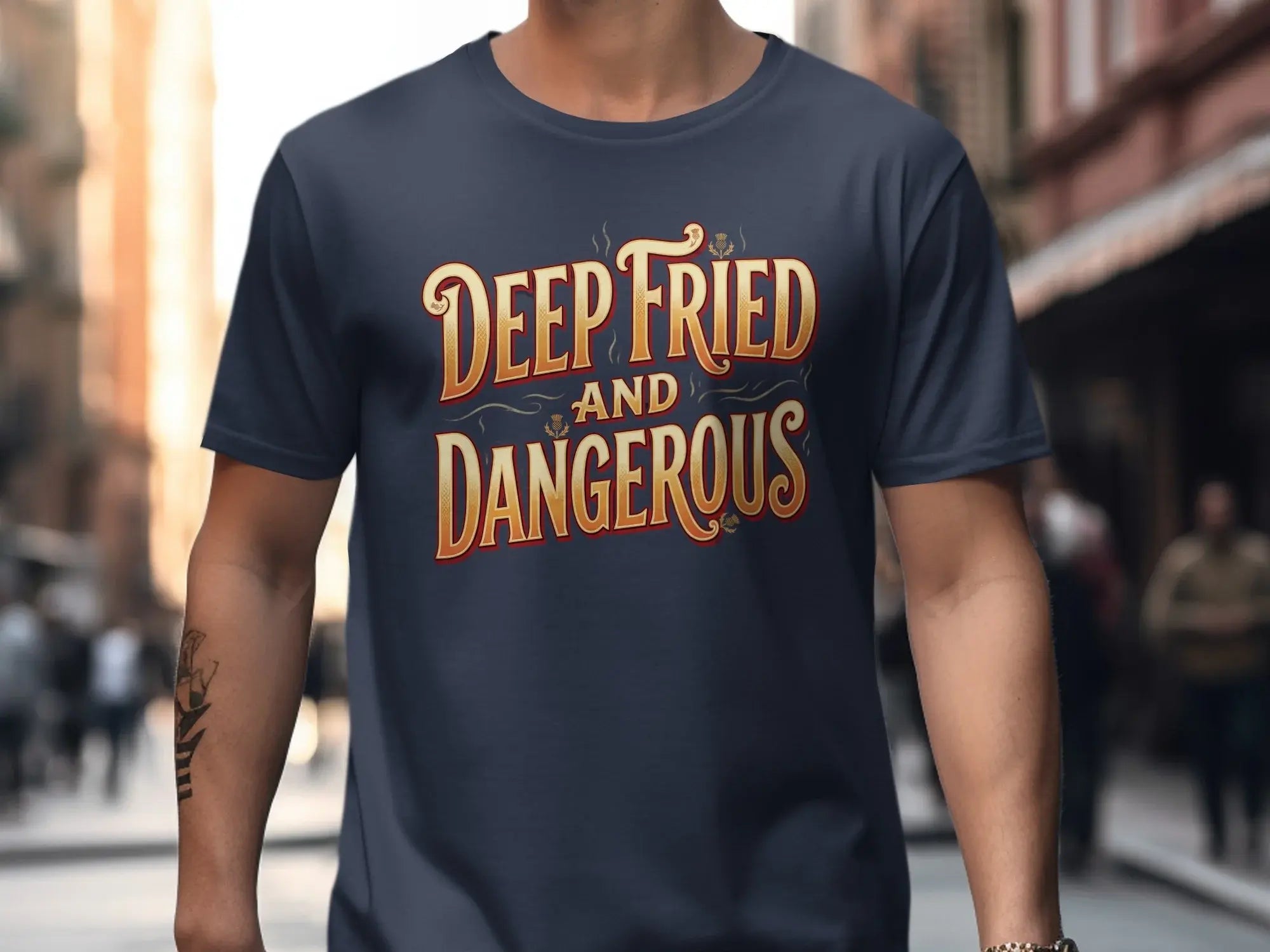 Navy t-shirt with "Deep Fried and Dangerous" text in gold and red lettering.