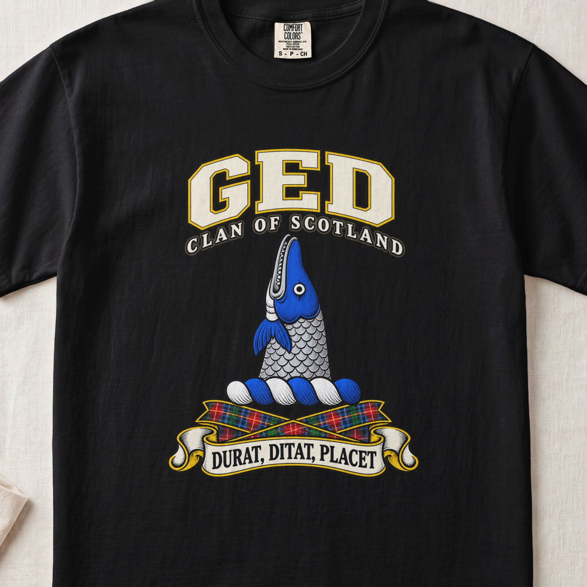 Ged Scottish clan T-shirt in Black, front view with an upright blue-and-silver fish and motto banner.