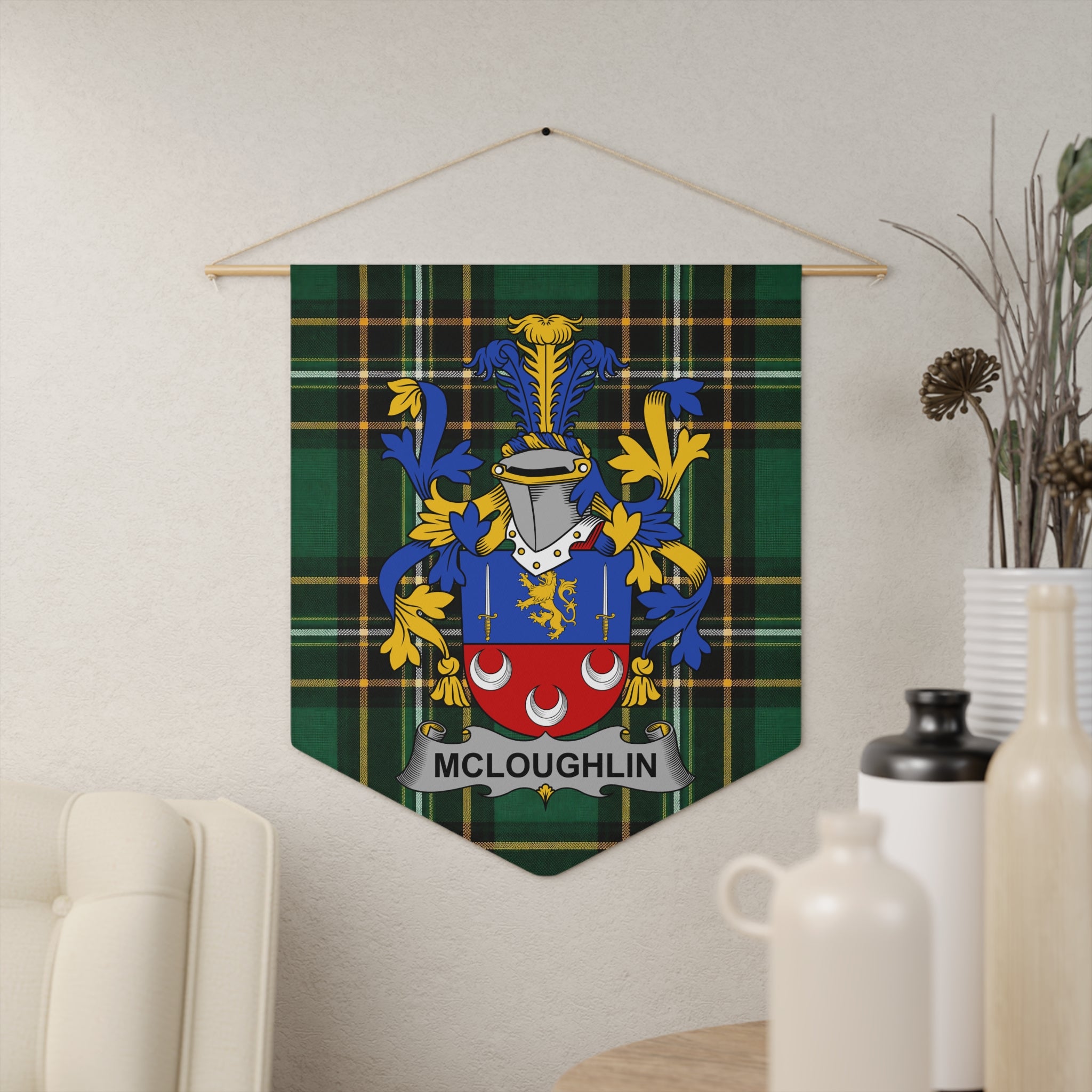 McLoughlin family crest on green tartan banner, hanging on wall.