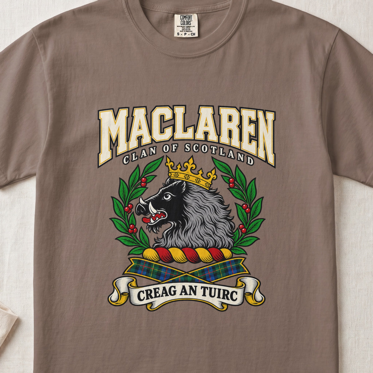 MacLaren graphic T-shirt in Espresso brown, front flat lay showing varsity lettering and crowned black and grey boar head with white tusks.
