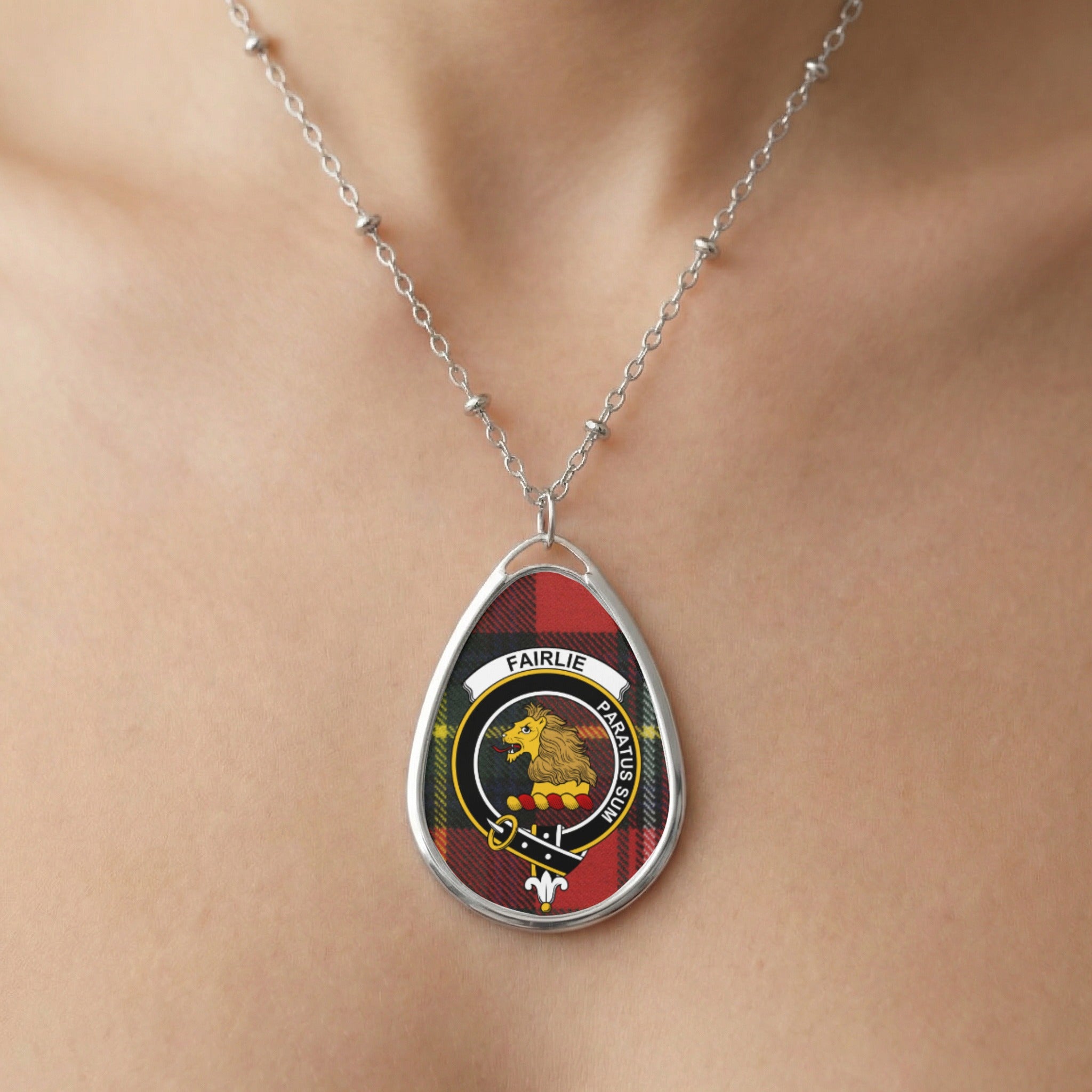 Close-up of Fairlie clan tartan pendant necklace with crest design