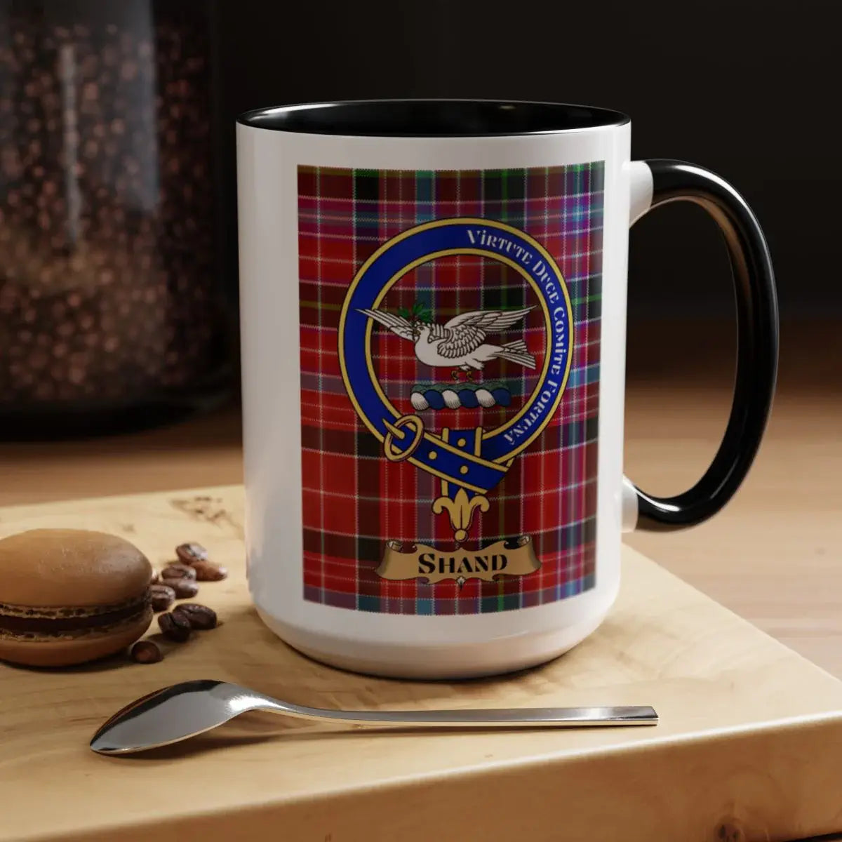 Close-up of the Shand clan crest printed on a ceramic mug
