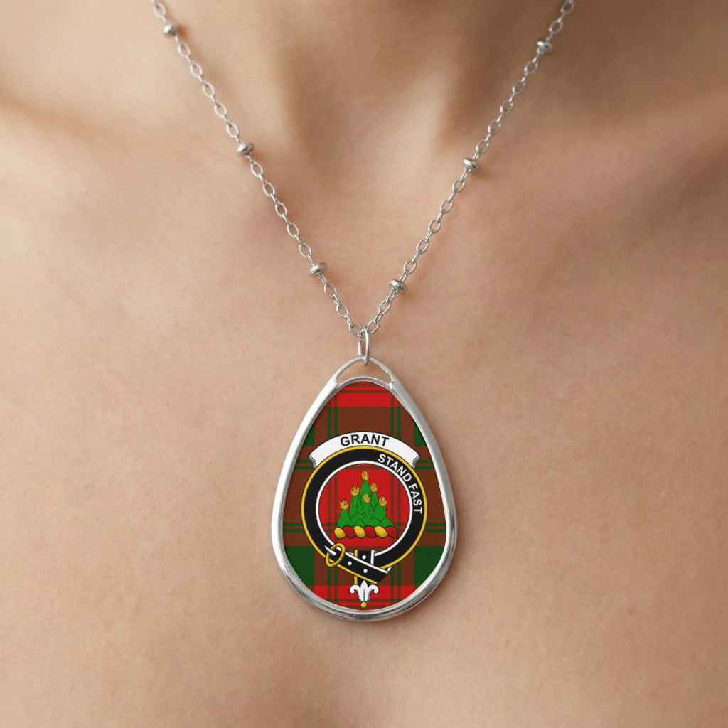 Close-up of Grant clan tartan pendant necklace with crest design