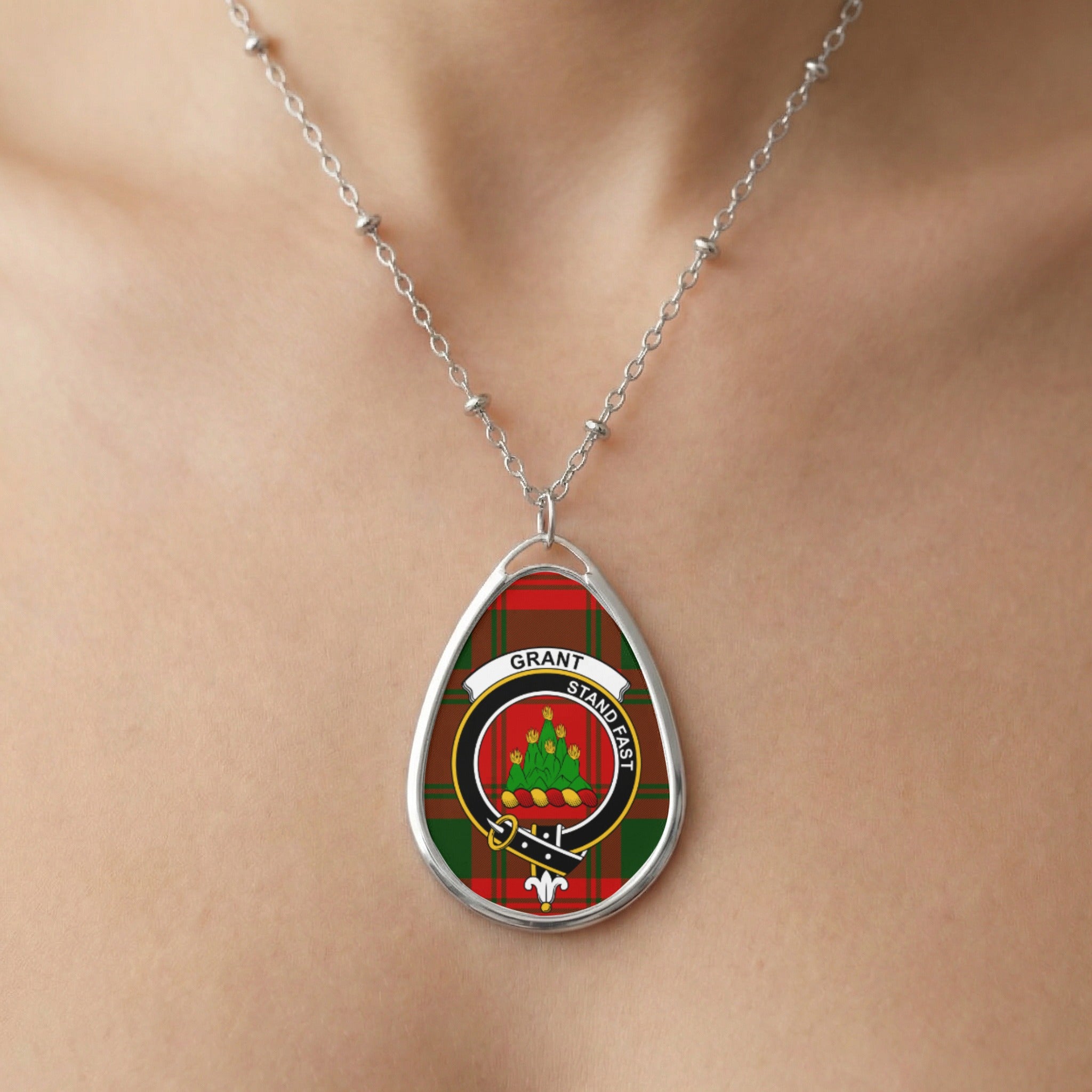 Close-up of Grant clan tartan pendant necklace with crest design