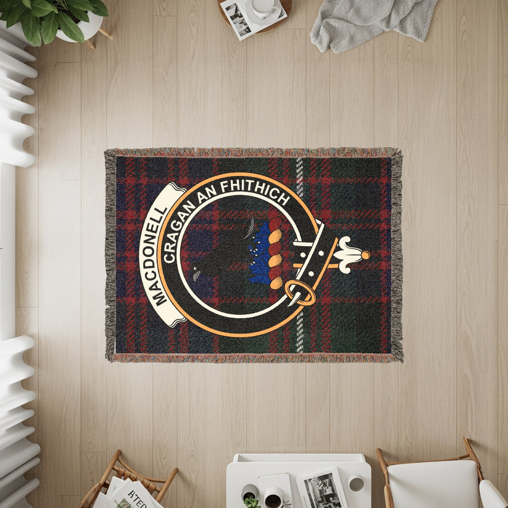 MacDonell of Glengarry woven blanket displayed on a wall, featuring the crest badge and tartan background