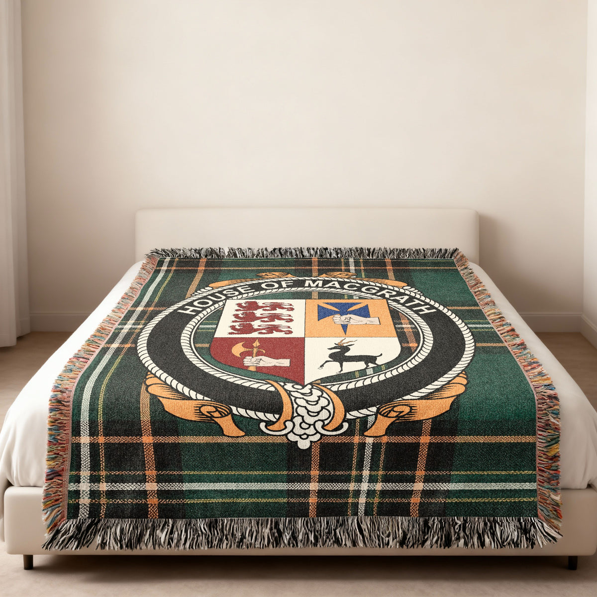 MacGrath family crest emblem woven blanket displayed on a bed