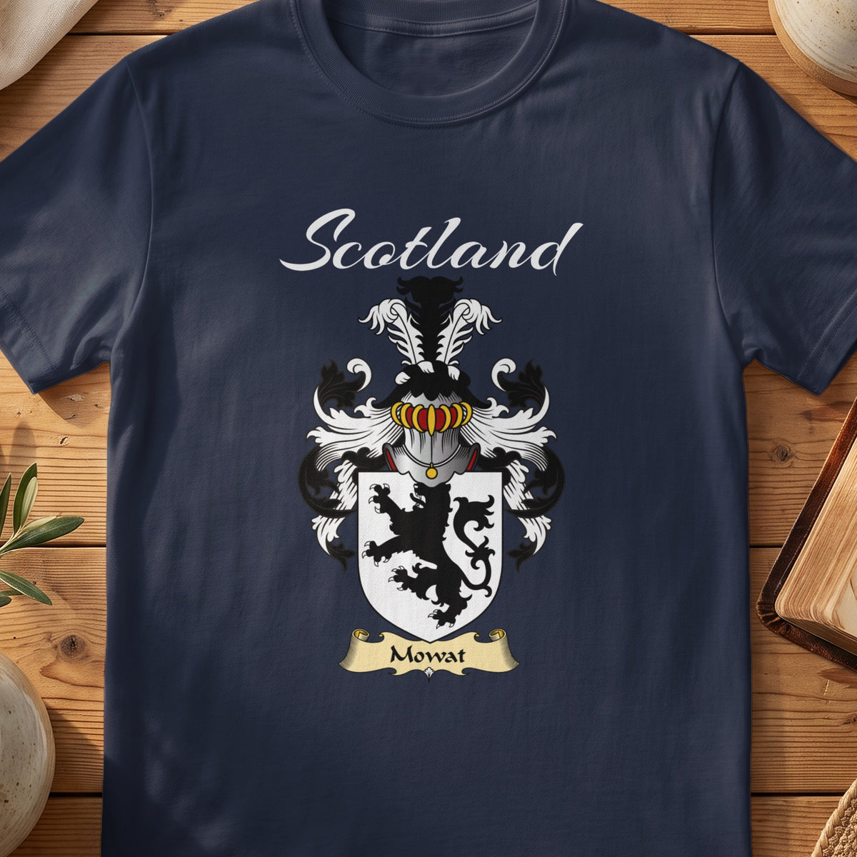 Navy Mowat family shield T-shirt featuring a black lion on a pale shield