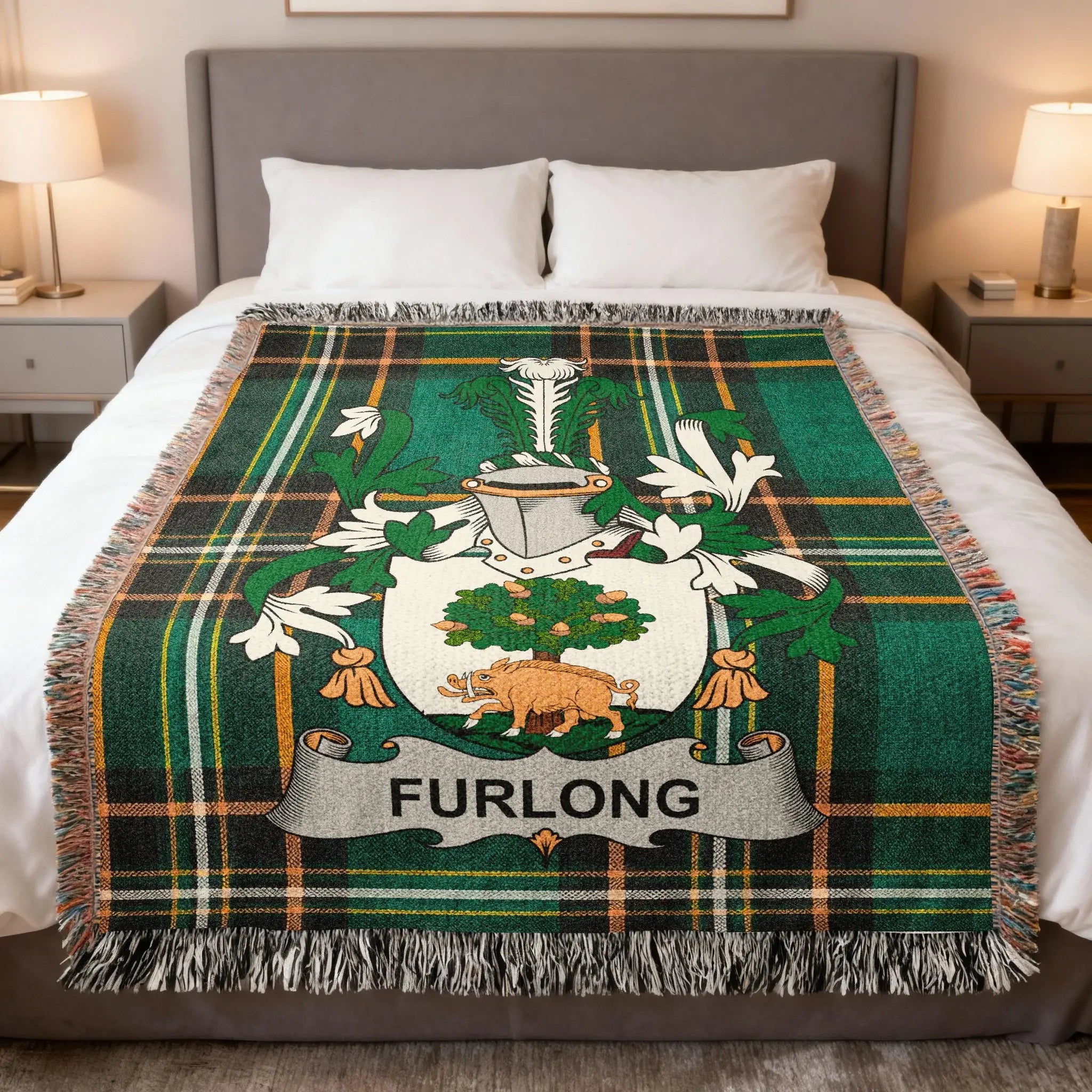 Furlong crest on a green plaid blanket with fringe.