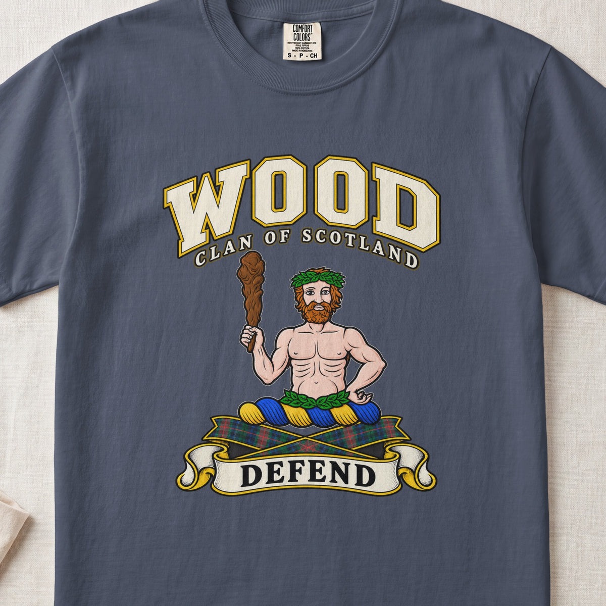 Wood Scottish clan T-shirt in Midnight, front view with a bearded figure holding a wooden club and motto banner.