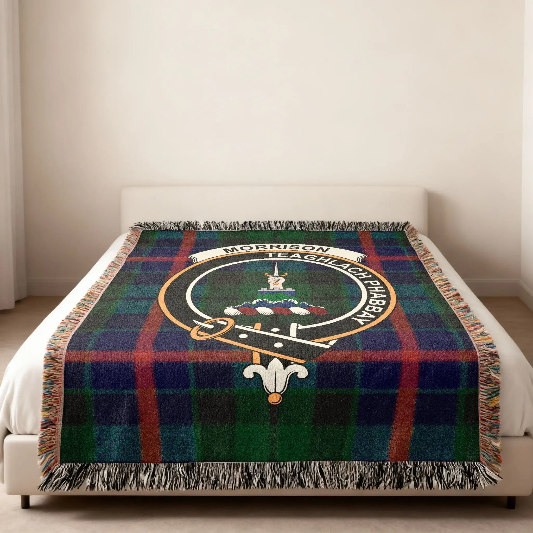 Morrison Teaghlach Phabbay tartan woven blanket folded with fringe — clan crest in cotton plaid
