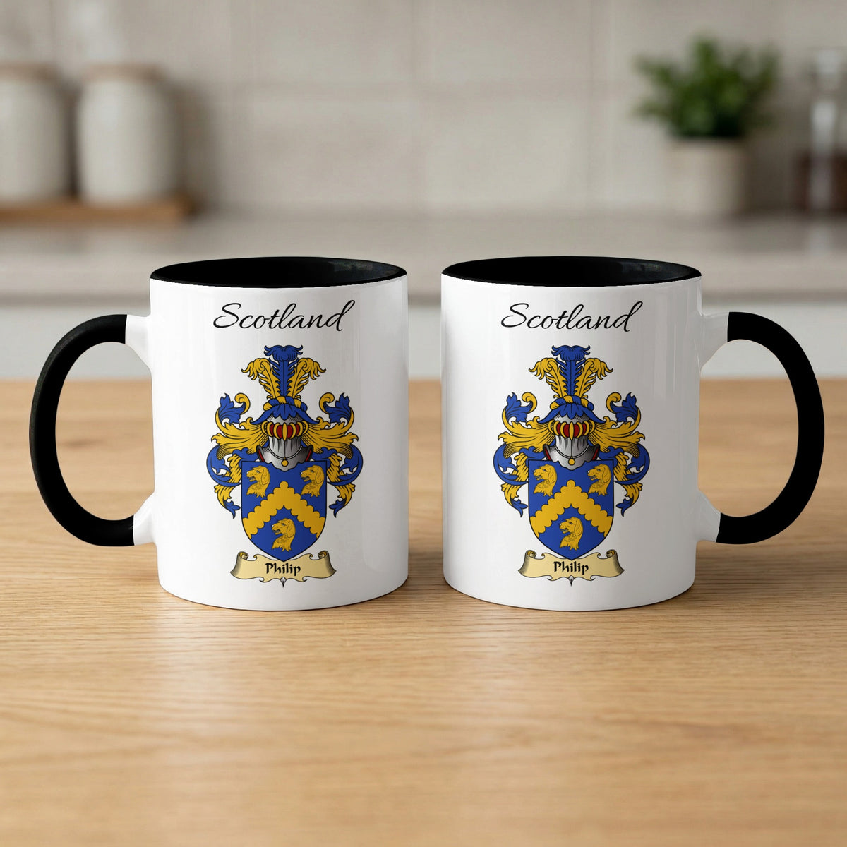 Pair of white Philip Scottish family shield mugs with black accents
