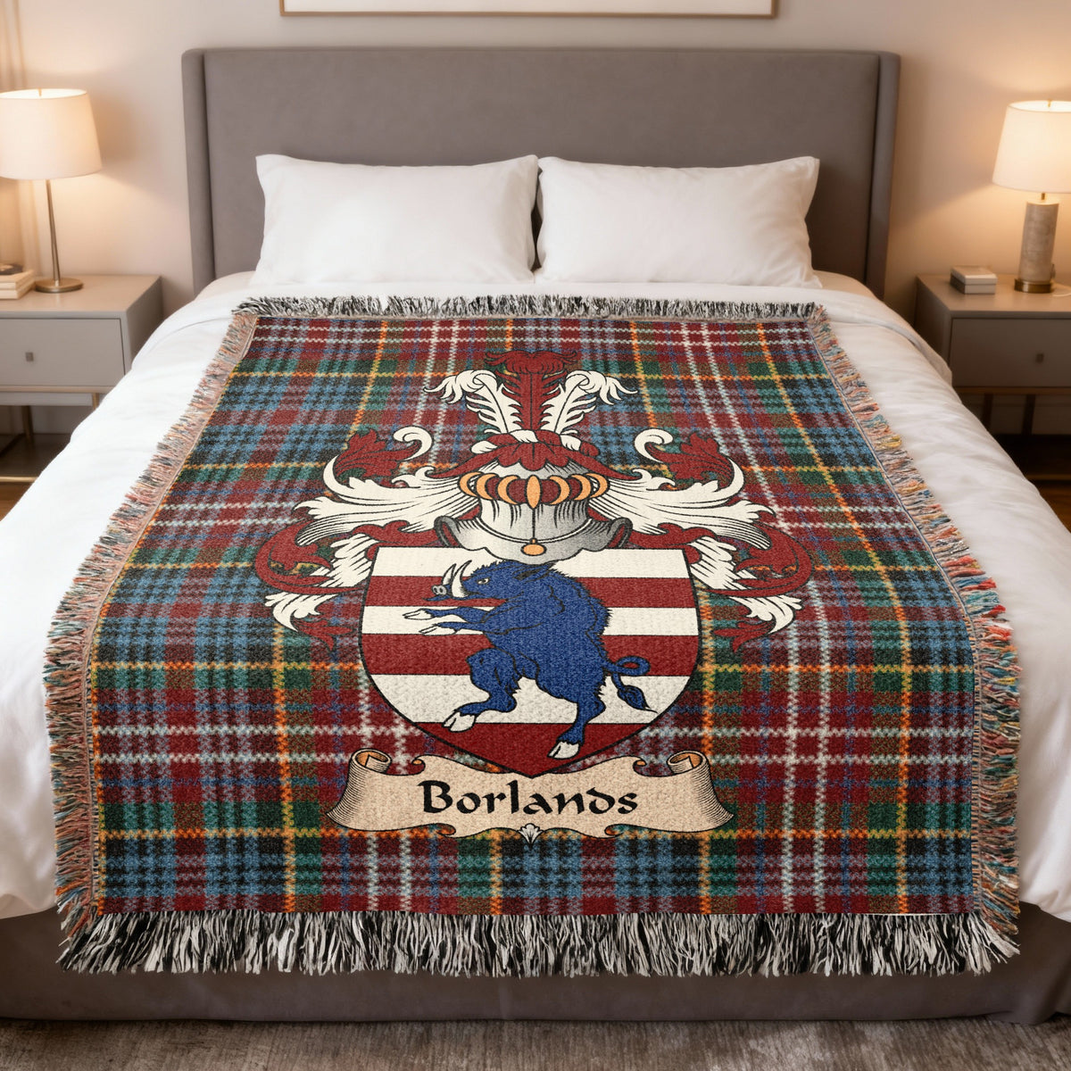 Borlands family crest emblem on a Caledonia tartan woven blanket