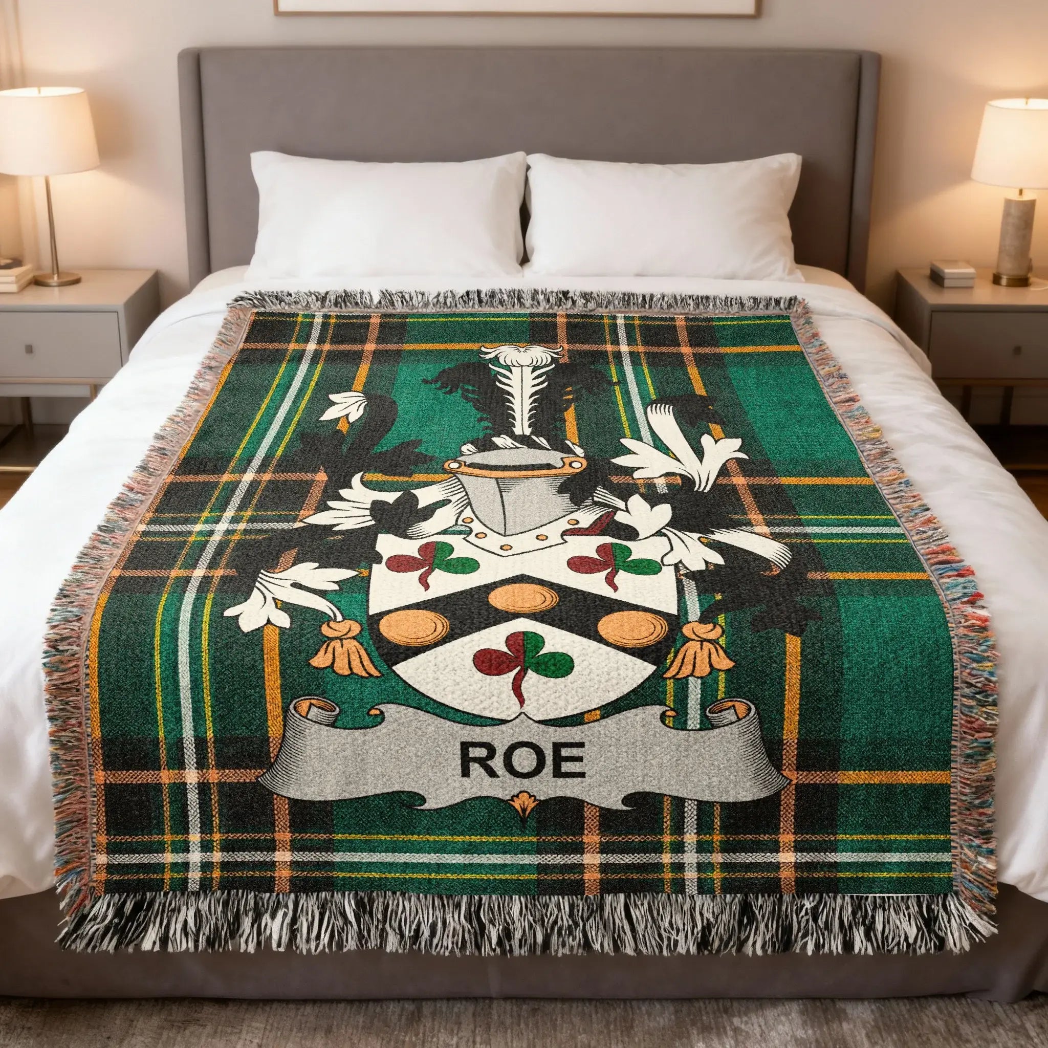 Tartan blanket featuring the Roe family crest in the center.