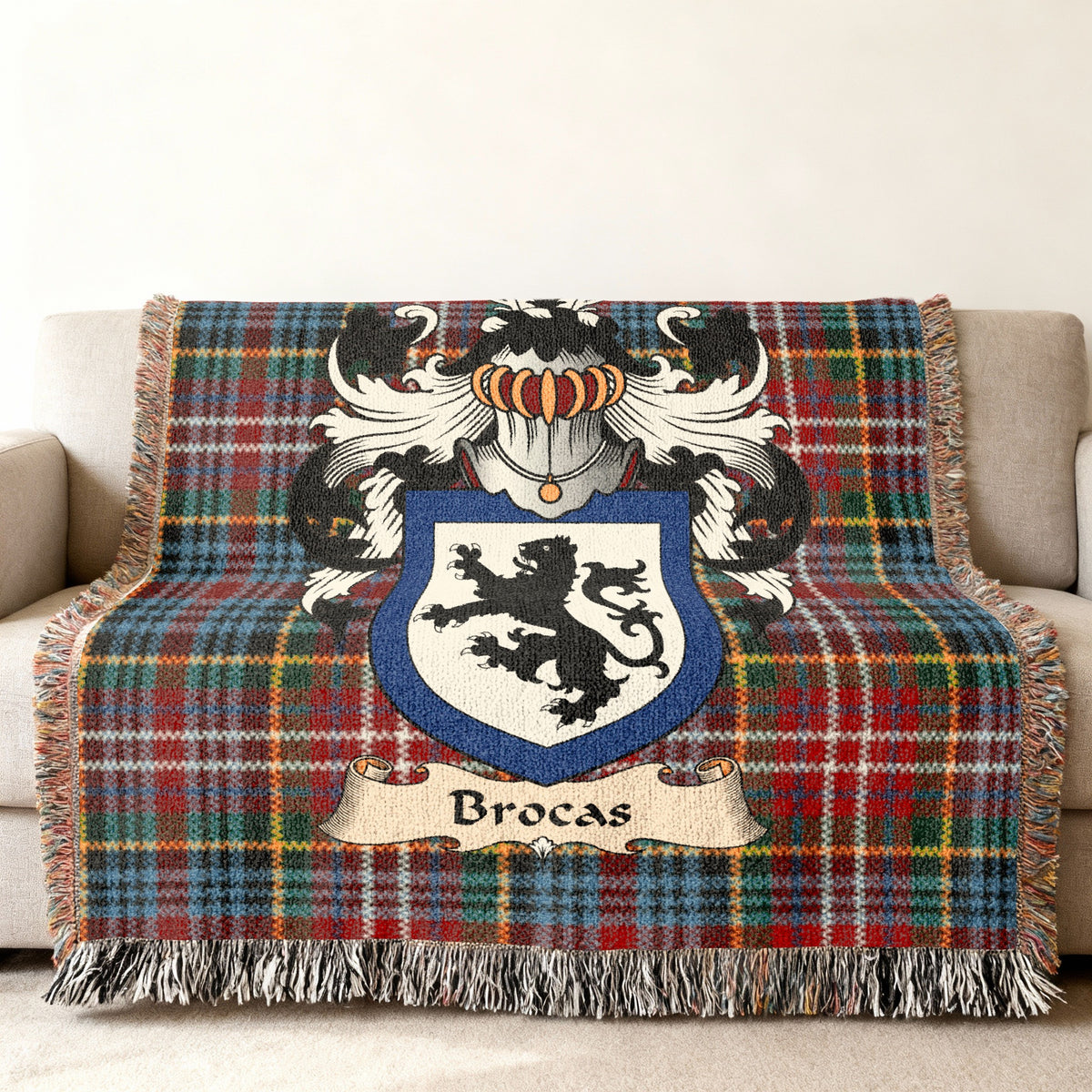 Brocas Scottish family shield woven blanket on a Caledonia tartan background