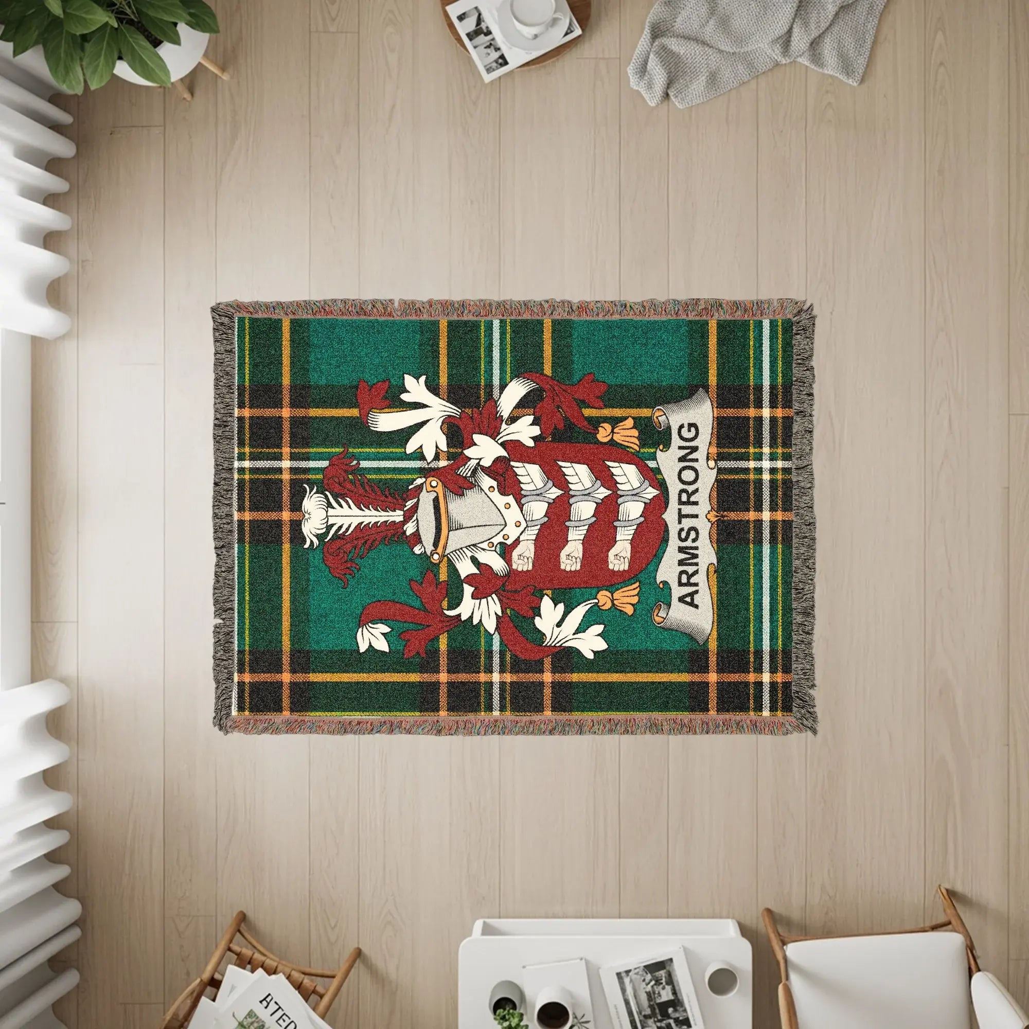 Armstrong family crest Irish woven blanket lifestyle shot — green tartan heritage throw on sofa