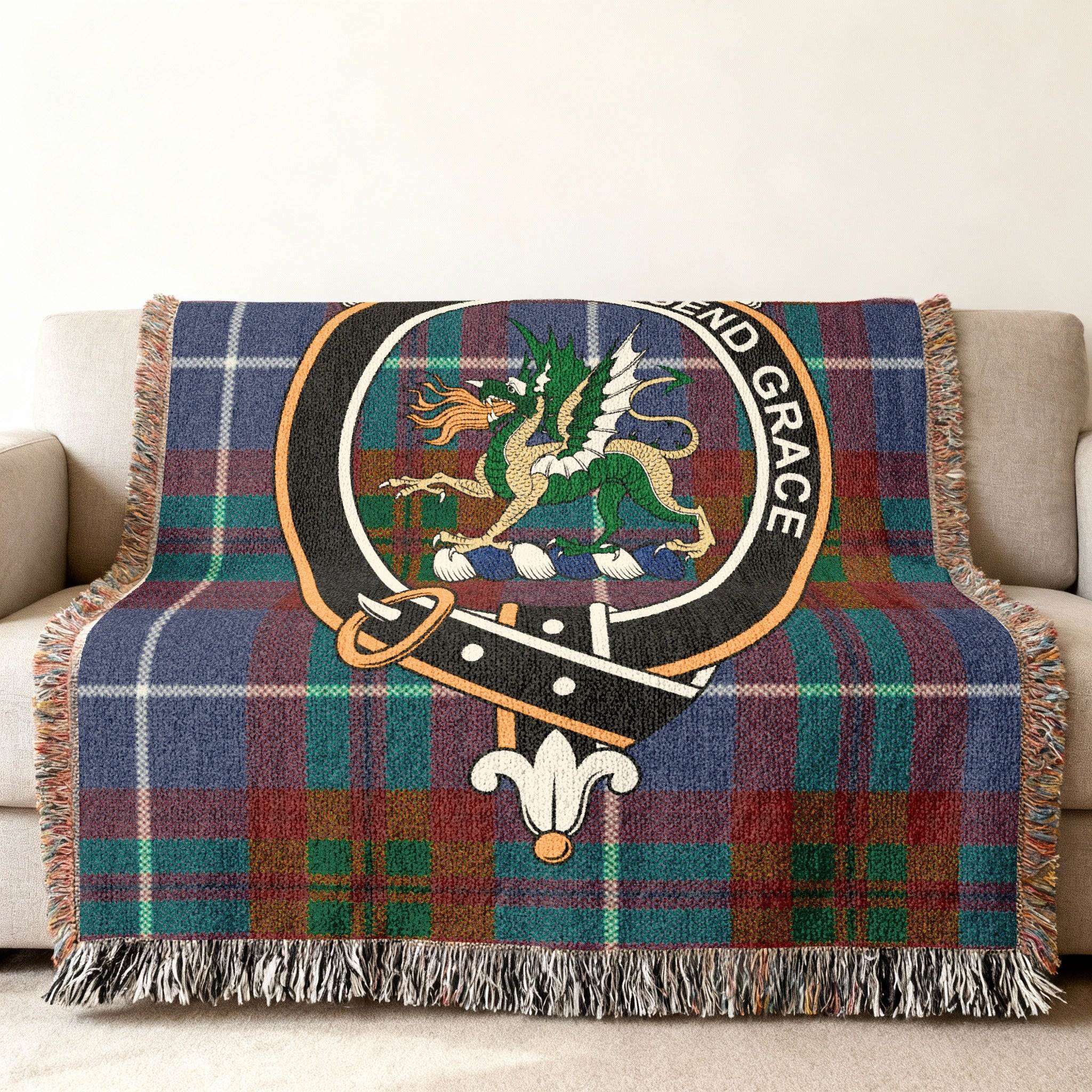 Crichton woven blanket draped over sofa — 60x50 size, fringe edges and tartan detail