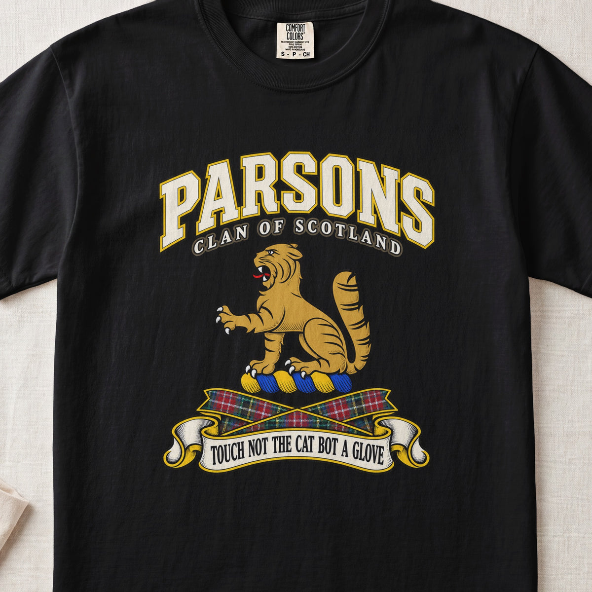 Parsons Scottish clan T-shirt in Black, front view with a golden wildcat and motto design.