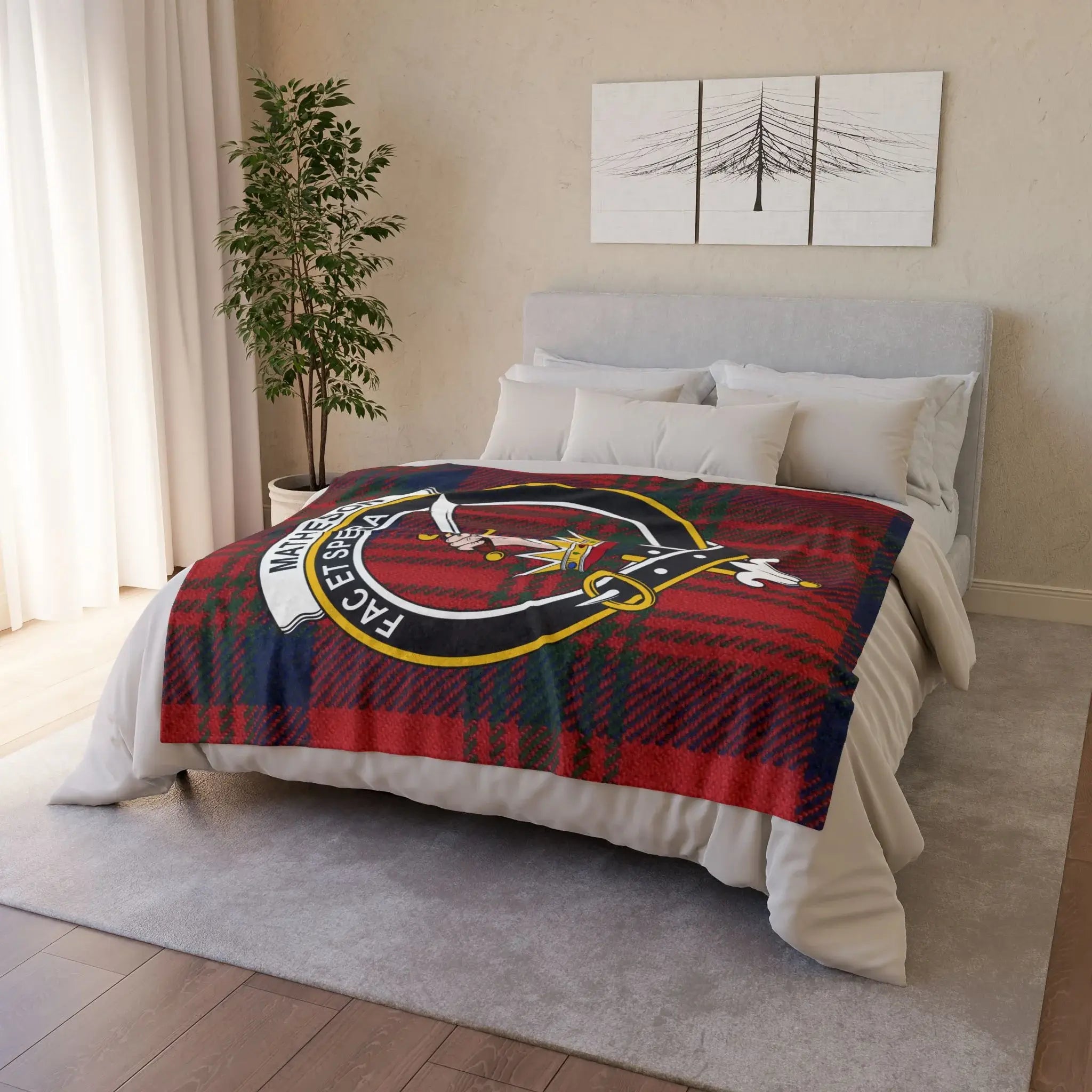 Matheson clan crest tartan blanket on bed — printed polyester throw with crest and tartan design