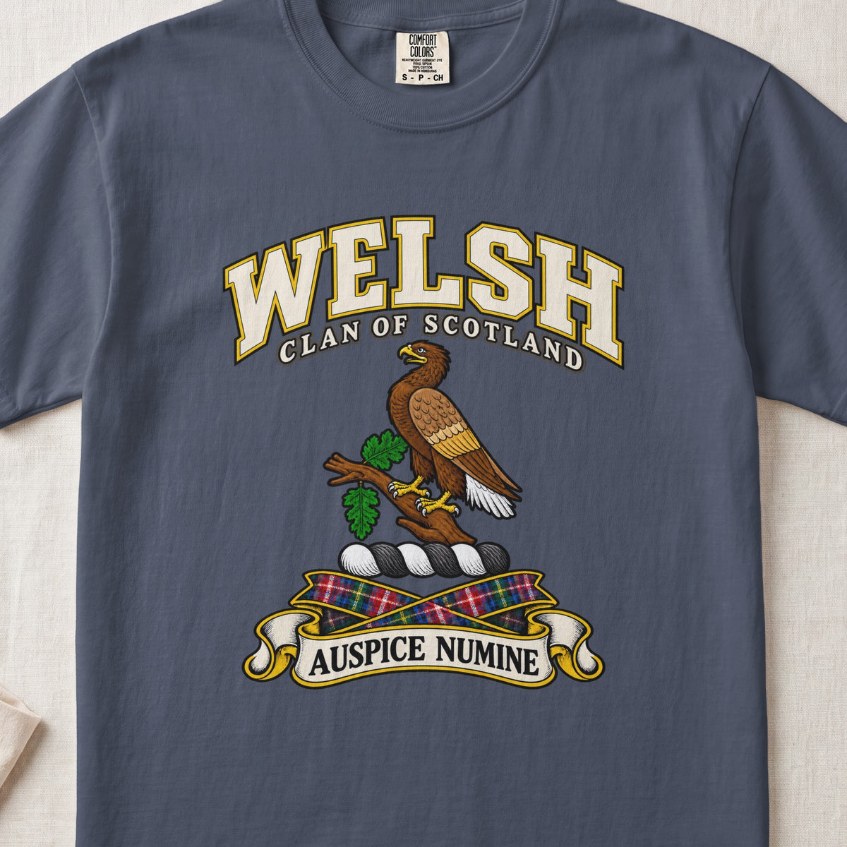 Welsh Scottish clan T-shirt in Midnight, front view with a brown eagle perched on a leafy branch and motto banner.