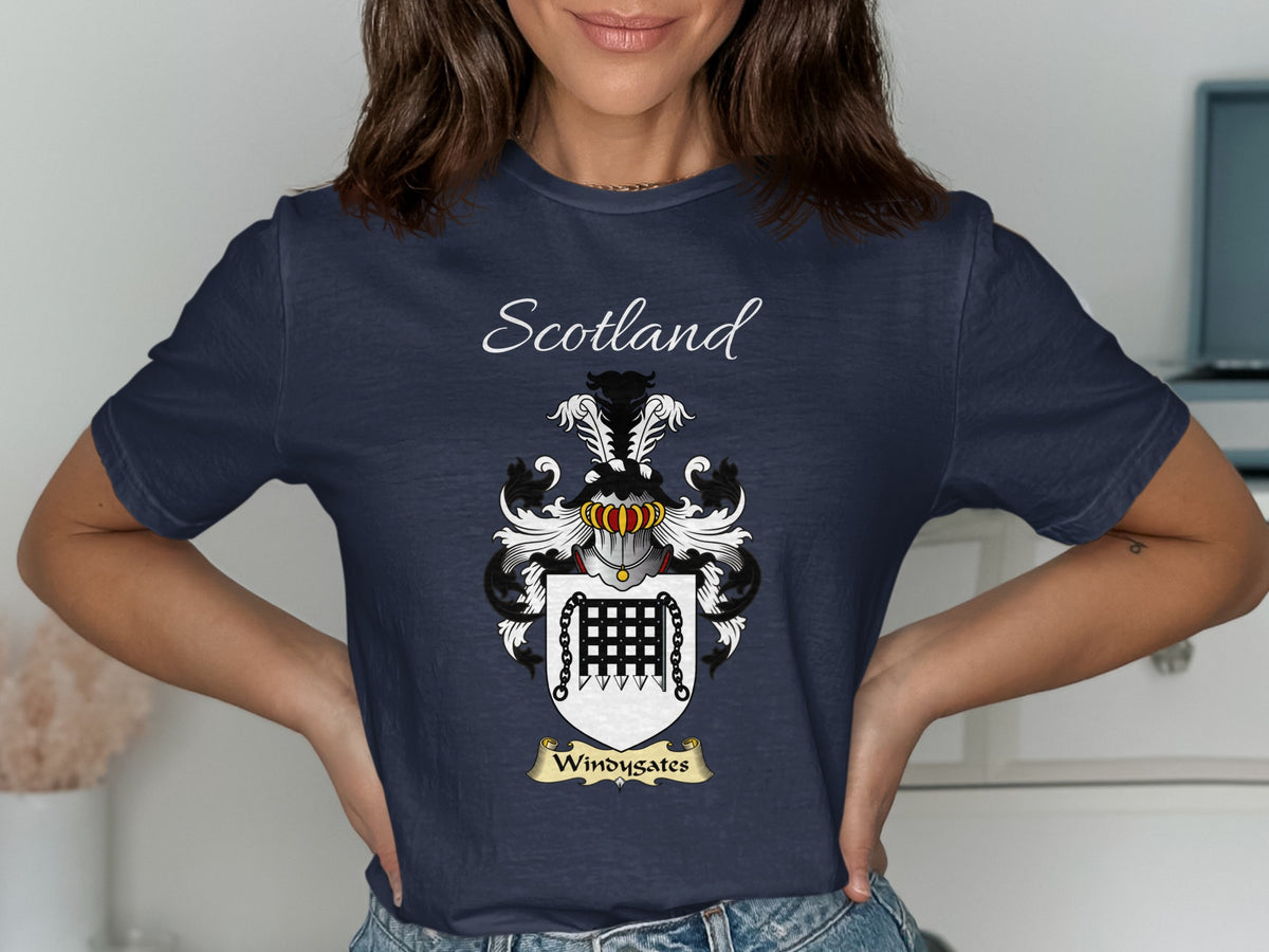 Model wearing the navy Windygates family crest T-shirt featuring “Scotland” and the surname banner.