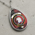 Ramsay clan Scottish tartan necklace with clan crest and Ora Et Labora motto on tartan background
