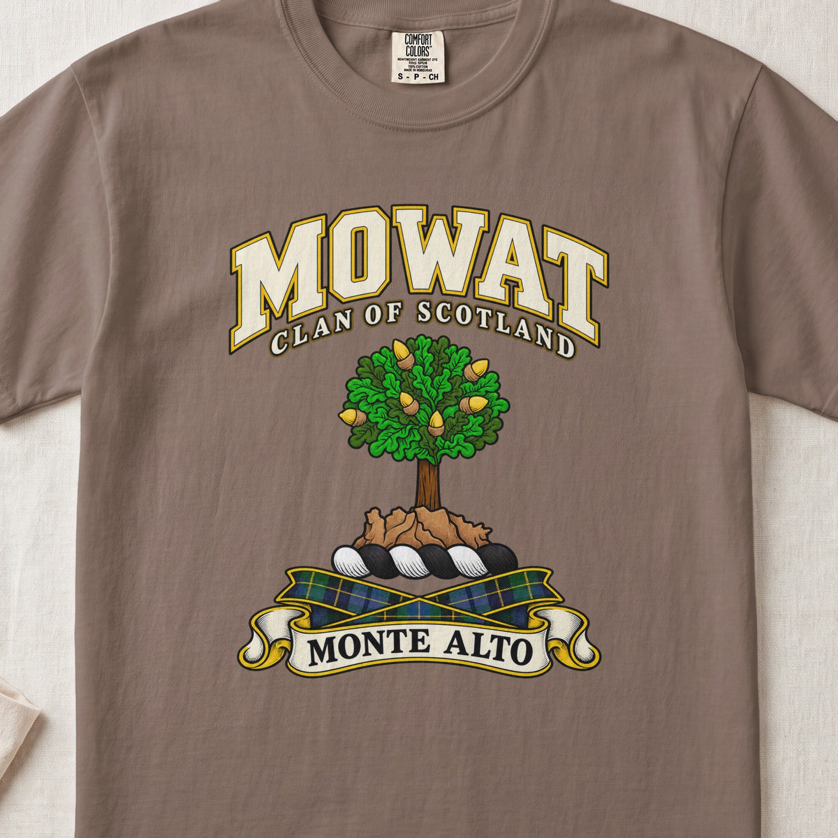 Mowat Scottish clan T-shirt in Espresso, front view with a green tree on a rocky mound and motto design.