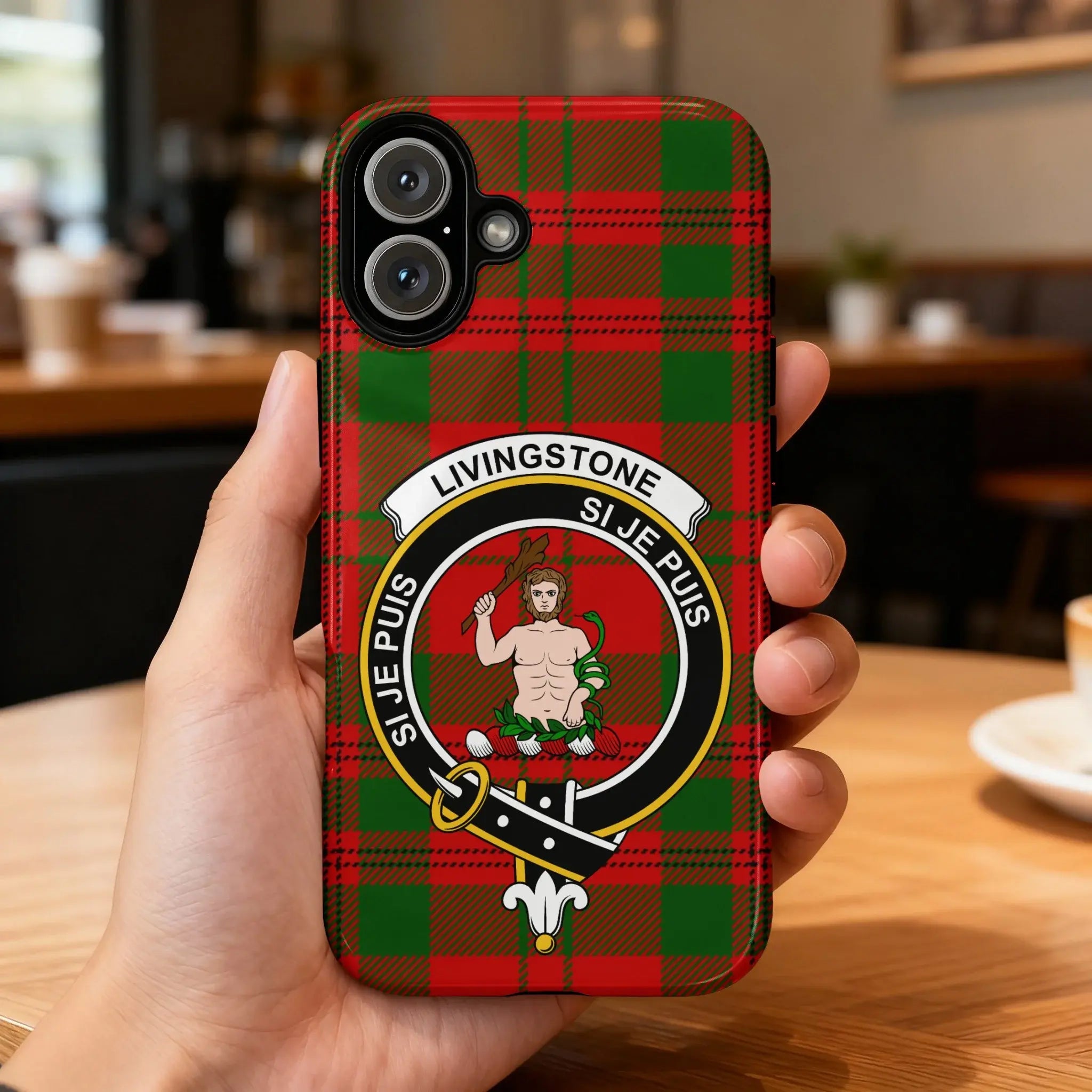 Clan Livingstone crest phone case — iPhone fit shown, edge-to-edge tartan print with precise port cutouts