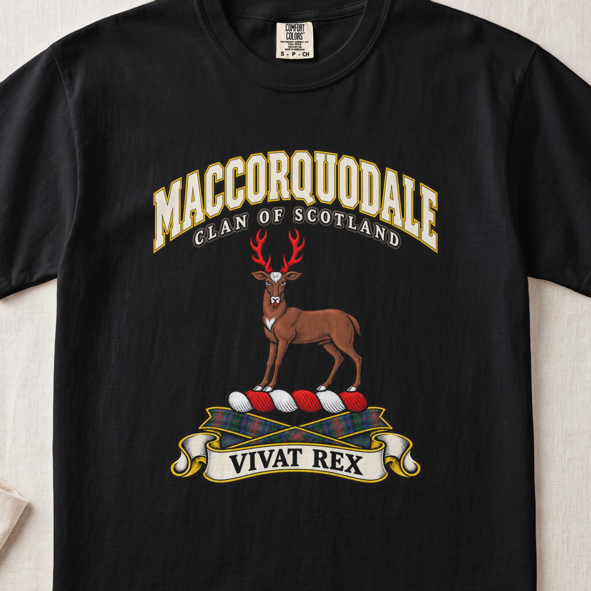 MacCorquodale Scottish clan T-shirt in Black, front view with a brown stag with antlers and motto banner.