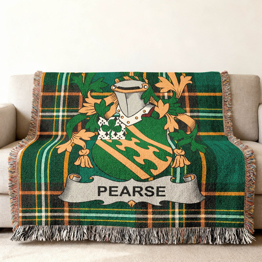 Green tartan throw blanket with Pearse family crest.