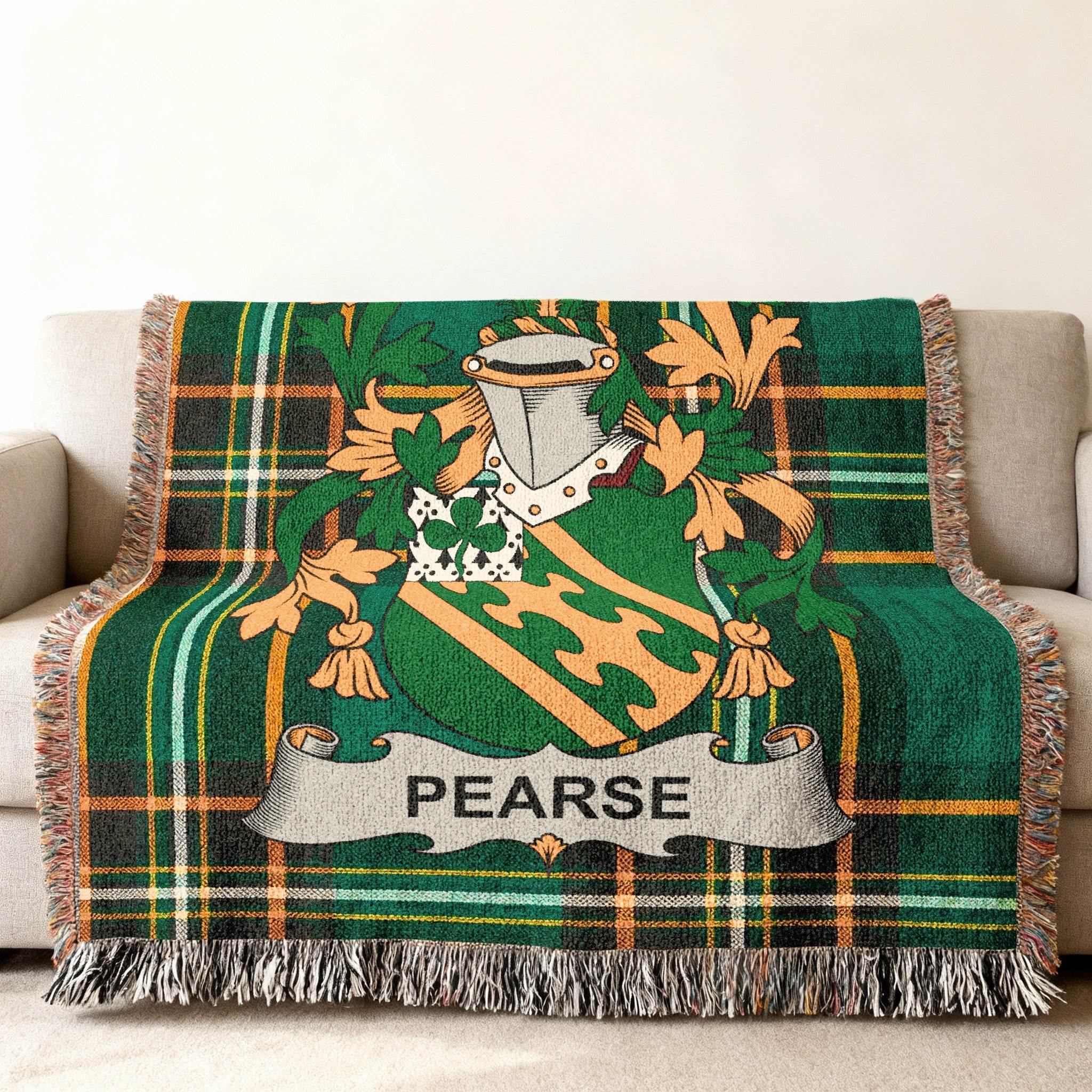 Green tartan throw blanket with Pearse family crest.